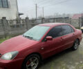 Червоний Міцубісі Lancer, об'ємом двигуна 1.58 л та пробігом 237 тис. км за 4700 $, фото 5 на Automoto.ua