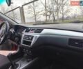 Червоний Міцубісі Lancer, об'ємом двигуна 2 л та пробігом 205 тис. км за 3900 $, фото 1 на Automoto.ua