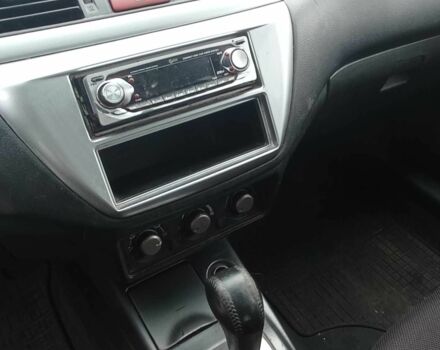 Красный Мицубиси Лансер, объемом двигателя 2 л и пробегом 320 тыс. км за 4600 $, фото 6 на Automoto.ua