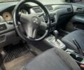 Красный Мицубиси Лансер, объемом двигателя 1.58 л и пробегом 180 тыс. км за 3750 $, фото 1 на Automoto.ua