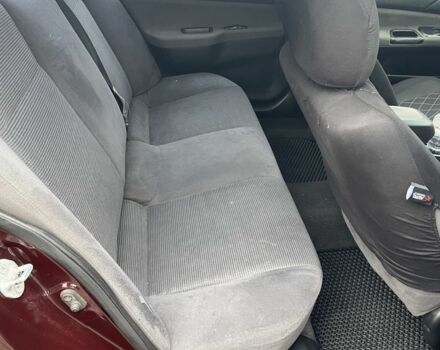 Красный Мицубиси Лансер, объемом двигателя 2 л и пробегом 295 тыс. км за 4150 $, фото 11 на Automoto.ua