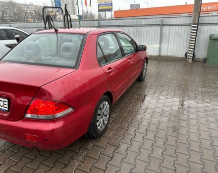 Червоний Міцубісі Lancer, об'ємом двигуна 1.6 л та пробігом 185 тис. км за 5000 $, фото 5 на Automoto.ua