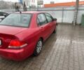 Червоний Міцубісі Lancer, об'ємом двигуна 1.6 л та пробігом 185 тис. км за 5000 $, фото 5 на Automoto.ua