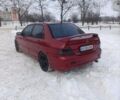 Червоний Міцубісі Lancer, об'ємом двигуна 2 л та пробігом 261 тис. км за 5000 $, фото 1 на Automoto.ua