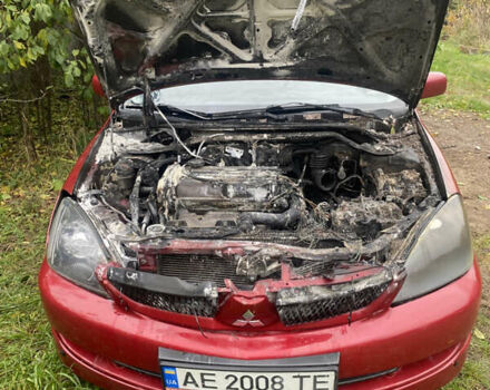 Міцубісі Lancer 2006 у Вышгороде на Automoto.ua Червоний Міцубісі Lancer, об'ємом двигуна 2 л та пробігом 320 тис. км за 2500 $, фото 3 на Automoto.ua