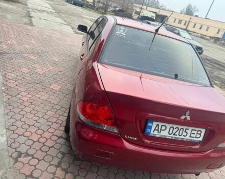 Красный Мицубиси Лансер, объемом двигателя 1.6 л и пробегом 276 тыс. км за 4350 $, фото 5 на Automoto.ua