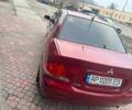 Красный Мицубиси Лансер, объемом двигателя 1.6 л и пробегом 276 тыс. км за 4350 $, фото 5 на Automoto.ua