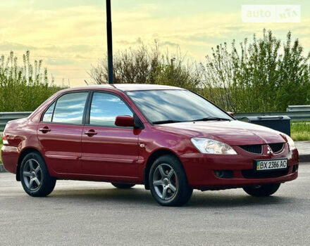 Червоний Міцубісі Lancer, об'ємом двигуна 1.6 л та пробігом 143 тис. км за 6300 $, фото 7 на Automoto.ua