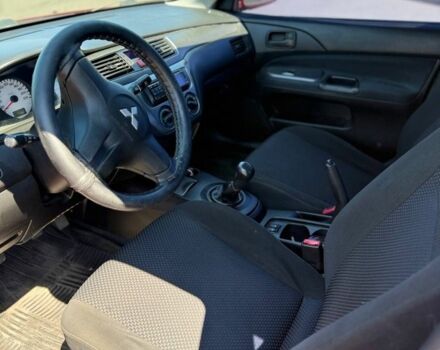 Червоний Міцубісі Lancer, об'ємом двигуна 1.6 л та пробігом 233 тис. км за 3800 $, фото 3 на Automoto.ua