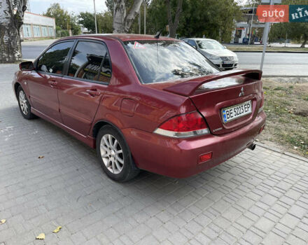 Червоний Міцубісі Lancer, об'ємом двигуна 1.58 л та пробігом 290 тис. км за 4250 $, фото 8 на Automoto.ua