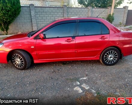 Мицубиси Лансер 2006 в Николаеве на Automoto.ua Красный Мицубиси Лансер, объемом двигателя 1.6 л и пробегом 260 тыс. км за 4600 $, фото 3 на Automoto.ua