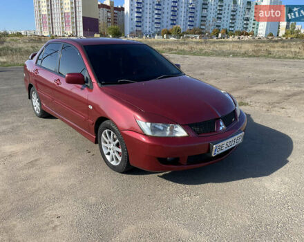 Красный Мицубиси Лансер, объемом двигателя 1.58 л и пробегом 290 тыс. км за 4350 $, фото 1 на Automoto.ua