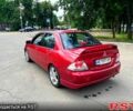 Красный Мицубиси Лансер, объемом двигателя 2 л и пробегом 223 тыс. км за 2900 $, фото 3 на Automoto.ua