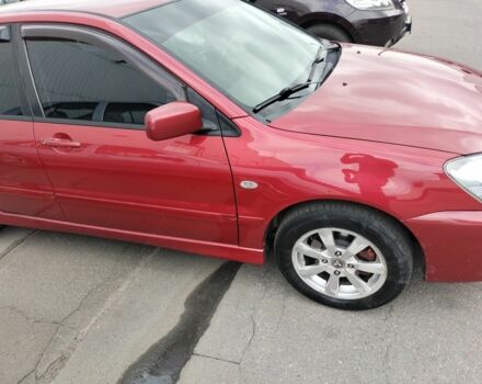 Красный Мицубиси Лансер, объемом двигателя 1.6 л и пробегом 273 тыс. км за 3622 $, фото 4 на Automoto.ua