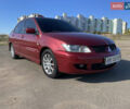 Червоний Міцубісі Lancer, об'ємом двигуна 1.58 л та пробігом 290 тис. км за 4350 $, фото 4 на Automoto.ua