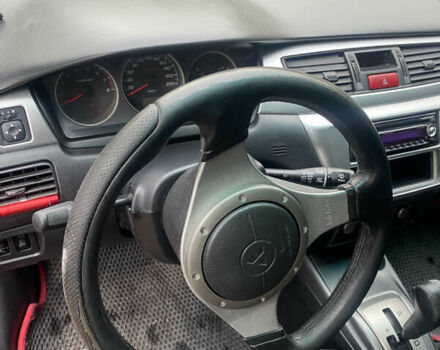 Міцубісі Lancer 2006 у Вышгороде на Automoto.ua Червоний Міцубісі Lancer, об'ємом двигуна 2 л та пробігом 320 тис. км за 2500 $, фото 8 на Automoto.ua