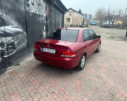 Красный Мицубиси Лансер, объемом двигателя 1.6 л и пробегом 276 тыс. км за 4350 $, фото 3 на Automoto.ua