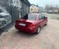 Красный Мицубиси Лансер, объемом двигателя 1.6 л и пробегом 276 тыс. км за 4350 $, фото 3 на Automoto.ua