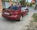 Червоний Міцубісі Lancer, об'ємом двигуна 1.58 л та пробігом 290 тис. км за 4250 $, фото 5 на Automoto.ua
