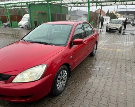 Червоний Міцубісі Lancer, об'ємом двигуна 1.6 л та пробігом 185 тис. км за 5000 $, фото 1 на Automoto.ua