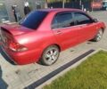 Красный Мицубиси Лансер, объемом двигателя 1.6 л и пробегом 73 тыс. км за 5500 $, фото 4 на Automoto.ua