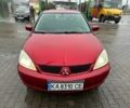 Червоний Міцубісі Lancer, об'ємом двигуна 1.6 л та пробігом 185 тис. км за 5000 $, фото 1 на Automoto.ua
