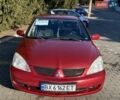 Червоний Міцубісі Lancer, об'ємом двигуна 1.58 л та пробігом 210 тис. км за 3800 $, фото 1 на Automoto.ua