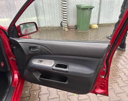 Червоний Міцубісі Lancer, об'ємом двигуна 1.6 л та пробігом 185 тис. км за 5000 $, фото 8 на Automoto.ua