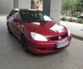 Красный Мицубиси Лансер, объемом двигателя 2 л и пробегом 334 тыс. км за 3900 $, фото 2 на Automoto.ua