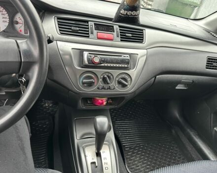Червоний Міцубісі Lancer, об'ємом двигуна 1.6 л та пробігом 185 тис. км за 5000 $, фото 16 на Automoto.ua