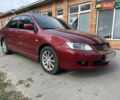Червоний Міцубісі Lancer, об'ємом двигуна 1.58 л та пробігом 290 тис. км за 4250 $, фото 4 на Automoto.ua