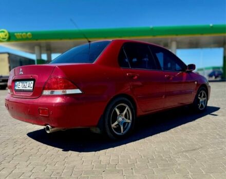 Червоний Міцубісі Lancer, об'ємом двигуна 1.6 л та пробігом 233 тис. км за 3800 $, фото 8 на Automoto.ua