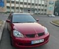 Красный Мицубиси Лансер, объемом двигателя 2 л и пробегом 307 тыс. км за 4500 $, фото 14 на Automoto.ua