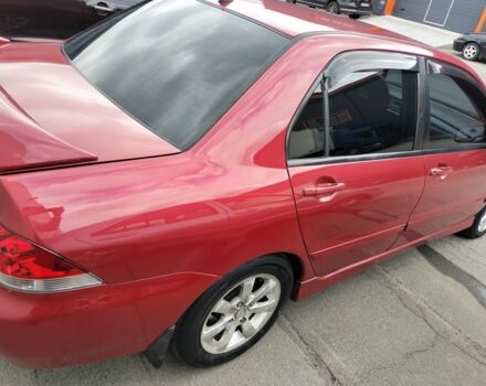 Красный Мицубиси Лансер, объемом двигателя 1.6 л и пробегом 273 тыс. км за 3622 $, фото 3 на Automoto.ua