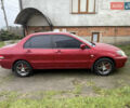 Червоний Міцубісі Lancer, об'ємом двигуна 1.58 л та пробігом 237 тис. км за 4700 $, фото 4 на Automoto.ua