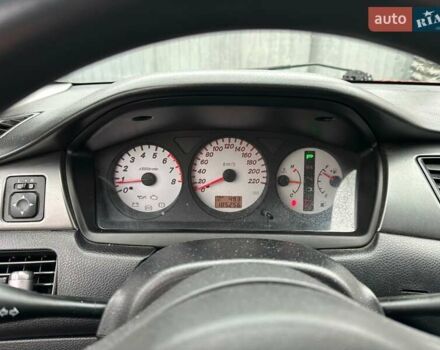 Красный Мицубиси Лансер, объемом двигателя 1.6 л и пробегом 185 тыс. км за 5000 $, фото 14 на Automoto.ua