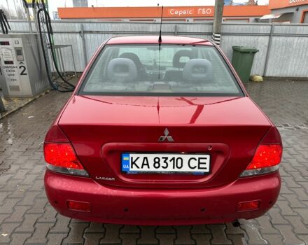 Червоний Міцубісі Lancer, об'ємом двигуна 1.6 л та пробігом 185 тис. км за 5000 $, фото 4 на Automoto.ua
