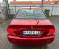 Червоний Міцубісі Lancer, об'ємом двигуна 1.6 л та пробігом 185 тис. км за 5000 $, фото 4 на Automoto.ua