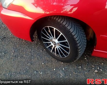 Мицубиси Лансер 2006 в Николаеве на Automoto.ua Красный Мицубиси Лансер, объемом двигателя 1.6 л и пробегом 260 тыс. км за 4600 $, фото 6 на Automoto.ua