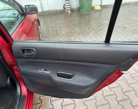 Червоний Міцубісі Lancer, об'ємом двигуна 1.6 л та пробігом 185 тис. км за 5000 $, фото 9 на Automoto.ua
