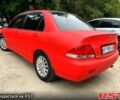 Червоний Міцубісі Lancer, об'ємом двигуна 1.6 л та пробігом 283 тис. км за 3500 $, фото 1 на Automoto.ua