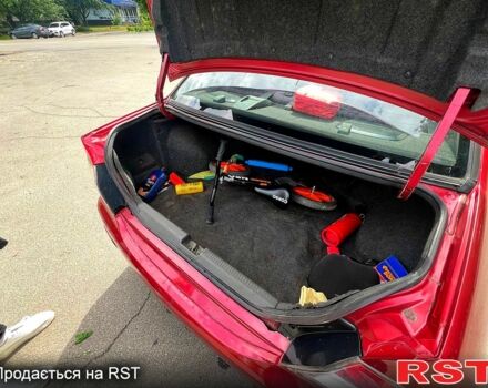 Красный Мицубиси Лансер, объемом двигателя 2 л и пробегом 223 тыс. км за 2900 $, фото 10 на Automoto.ua