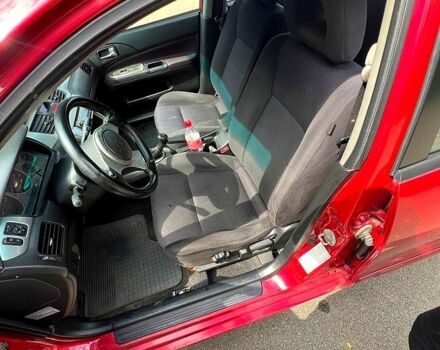 Красный Мицубиси Лансер, объемом двигателя 2 л и пробегом 223 тыс. км за 2900 $, фото 11 на Automoto.ua