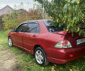 Міцубісі Lancer 2006 у Вышгороде на Automoto.ua Червоний Міцубісі Lancer, об'ємом двигуна 2 л та пробігом 320 тис. км за 2500 $, фото 4 на Automoto.ua