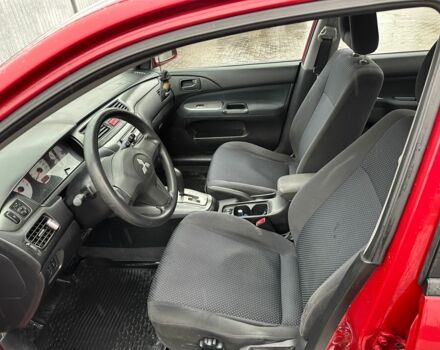 Червоний Міцубісі Lancer, об'ємом двигуна 1.6 л та пробігом 185 тис. км за 5000 $, фото 14 на Automoto.ua
