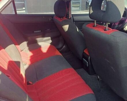 Красный Мицубиси Лансер, объемом двигателя 1.6 л и пробегом 73 тыс. км за 5500 $, фото 6 на Automoto.ua