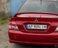 Червоний Міцубісі Lancer, об'ємом двигуна 2 л та пробігом 320 тис. км за 5700 $, фото 1 на Automoto.ua