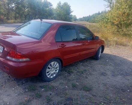 Червоний Міцубісі Lancer, об'ємом двигуна 1.6 л та пробігом 248 тис. км за 3550 $, фото 3 на Automoto.ua