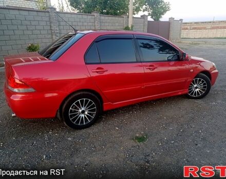 Мицубиси Лансер 2006 в Николаеве на Automoto.ua Красный Мицубиси Лансер, объемом двигателя 1.6 л и пробегом 260 тыс. км за 4600 $, фото 4 на Automoto.ua
