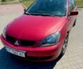 Червоний Міцубісі Lancer, об'ємом двигуна 1.6 л та пробігом 233 тис. км за 3800 $, фото 9 на Automoto.ua